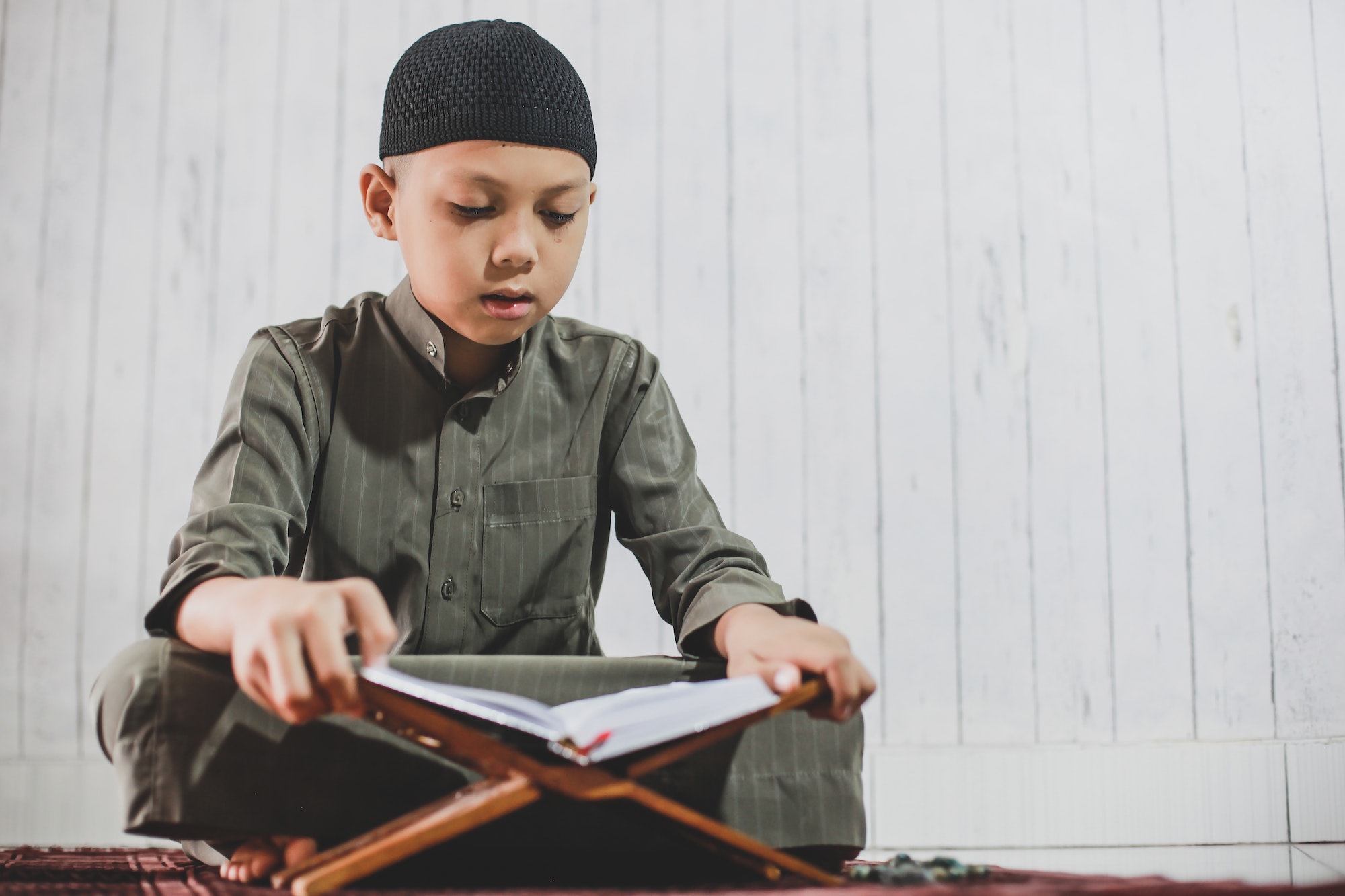 Muslim Boy Reading Holy Quran