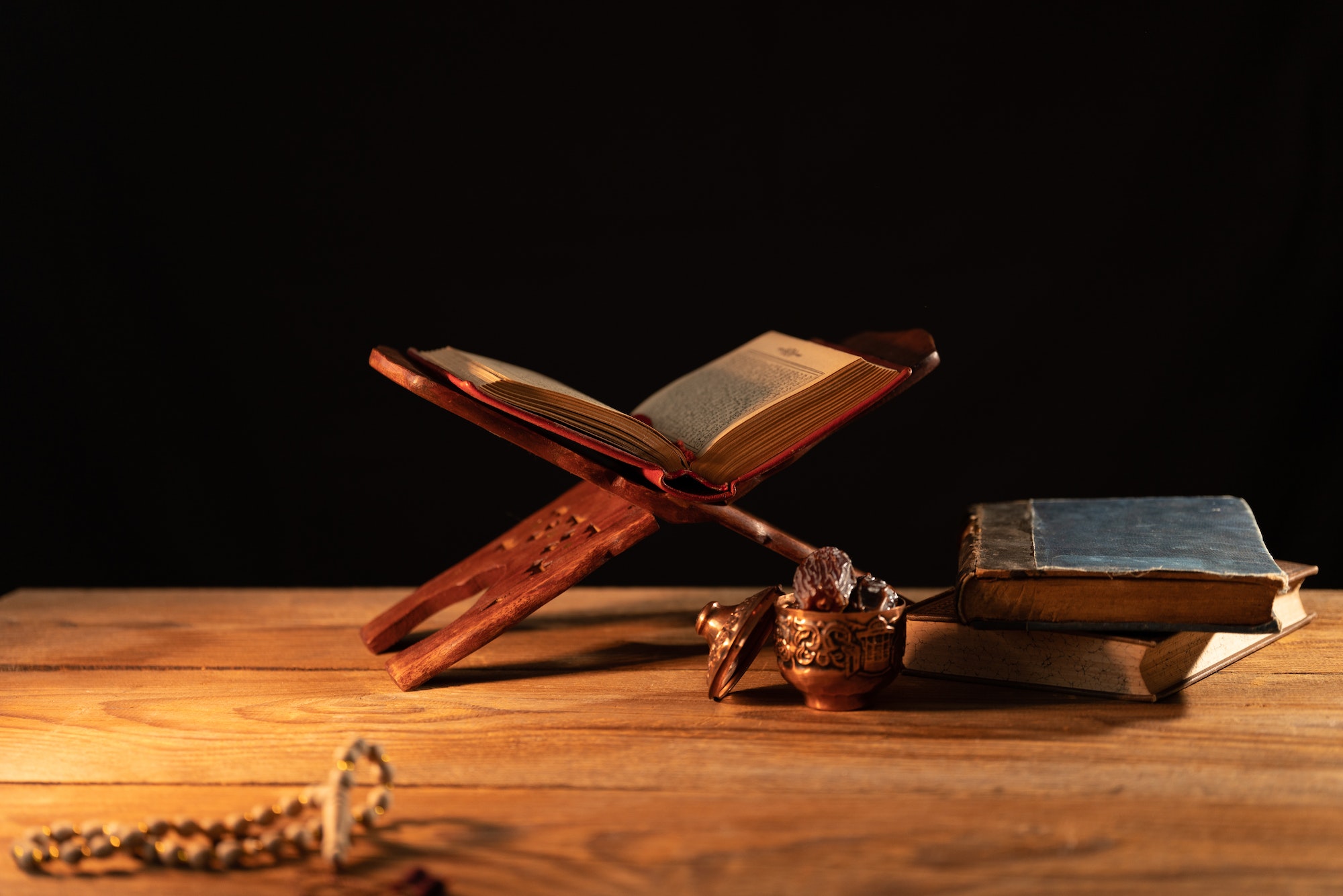 The holy book Quran on an oriental wooden bookstand